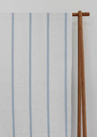 Rune Agate Blue - vertical blue tone striped fabric.