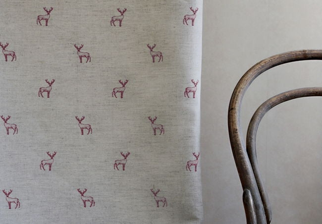 Deer Cherry - Curtain fabric with red pattern of deers