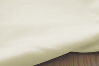 Close-up shot of the structure of the Amara Cream cotton fabric