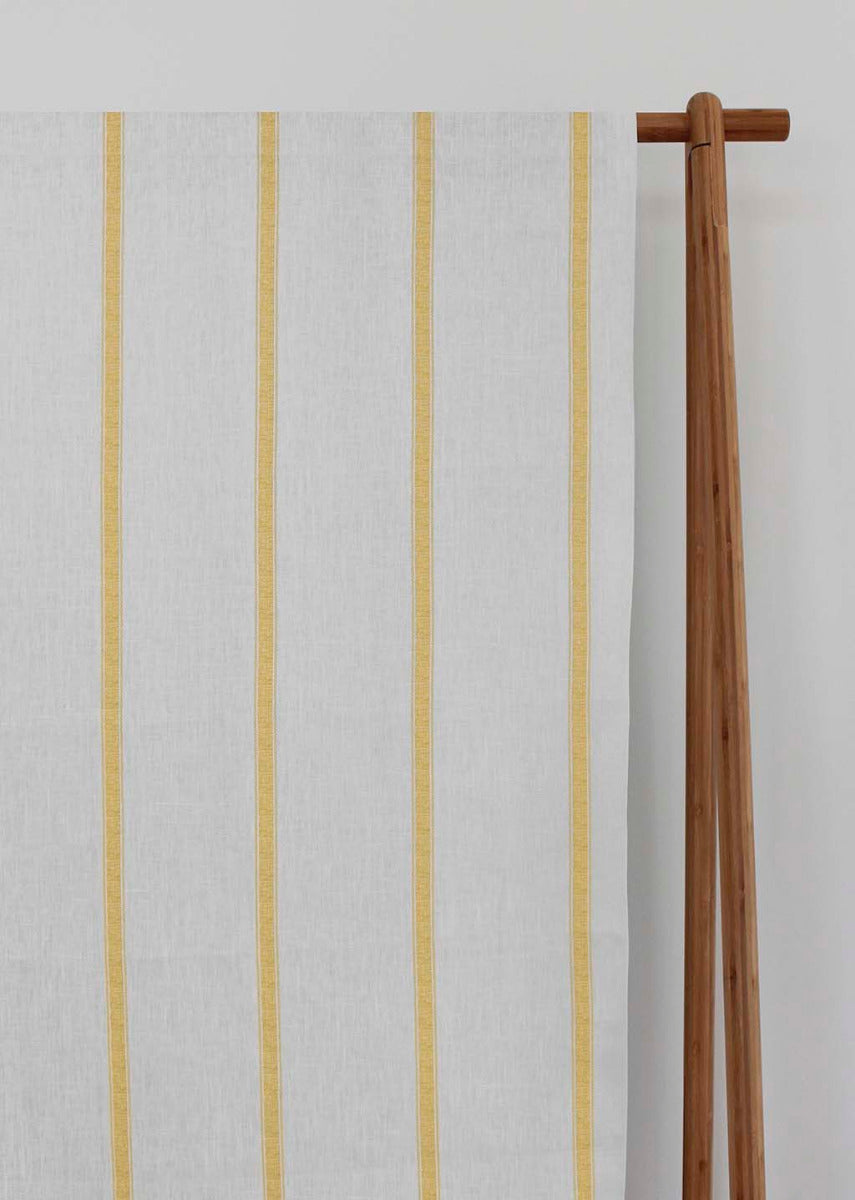 Rune Gold Amber - vertical yellow tone striped fabric.