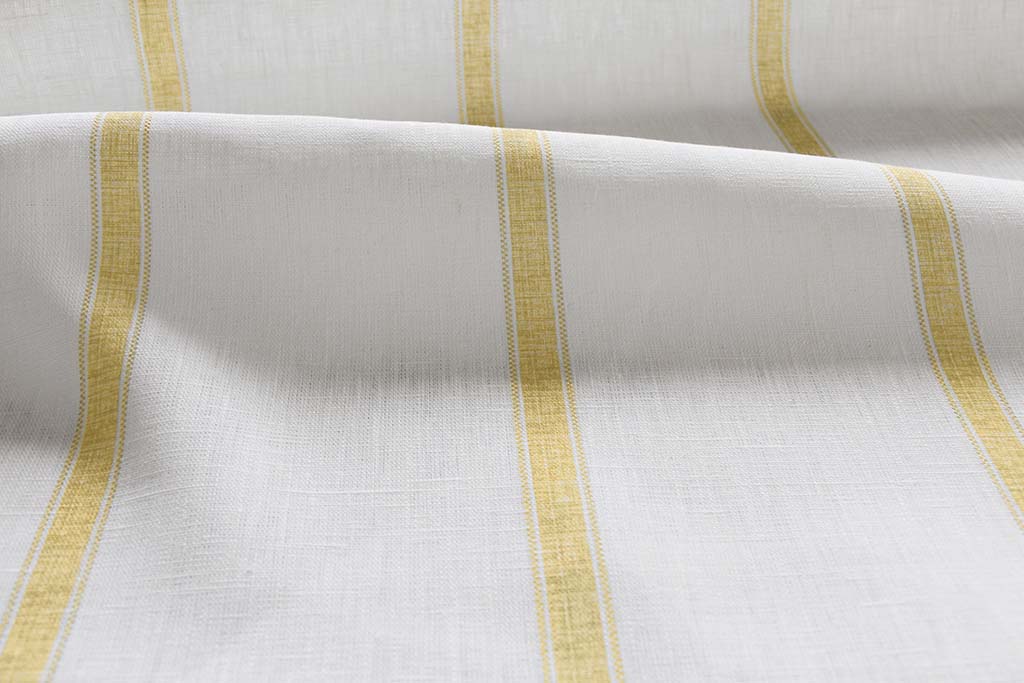 Rune Gold Amber - vertical yellow tone striped fabric.