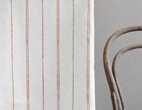 Inga Terracotta - White fabric with Orange decorative stripes, 100% Linen