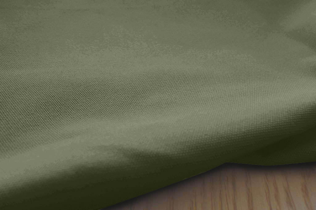 Close-up shot of this ivy green 100% Cotton fabric