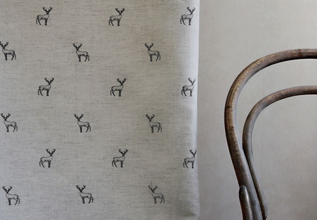 Deer Noir - Curtain fabric with black pattern of deers