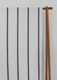 Rune Noir- vertical black tone striped fabric.