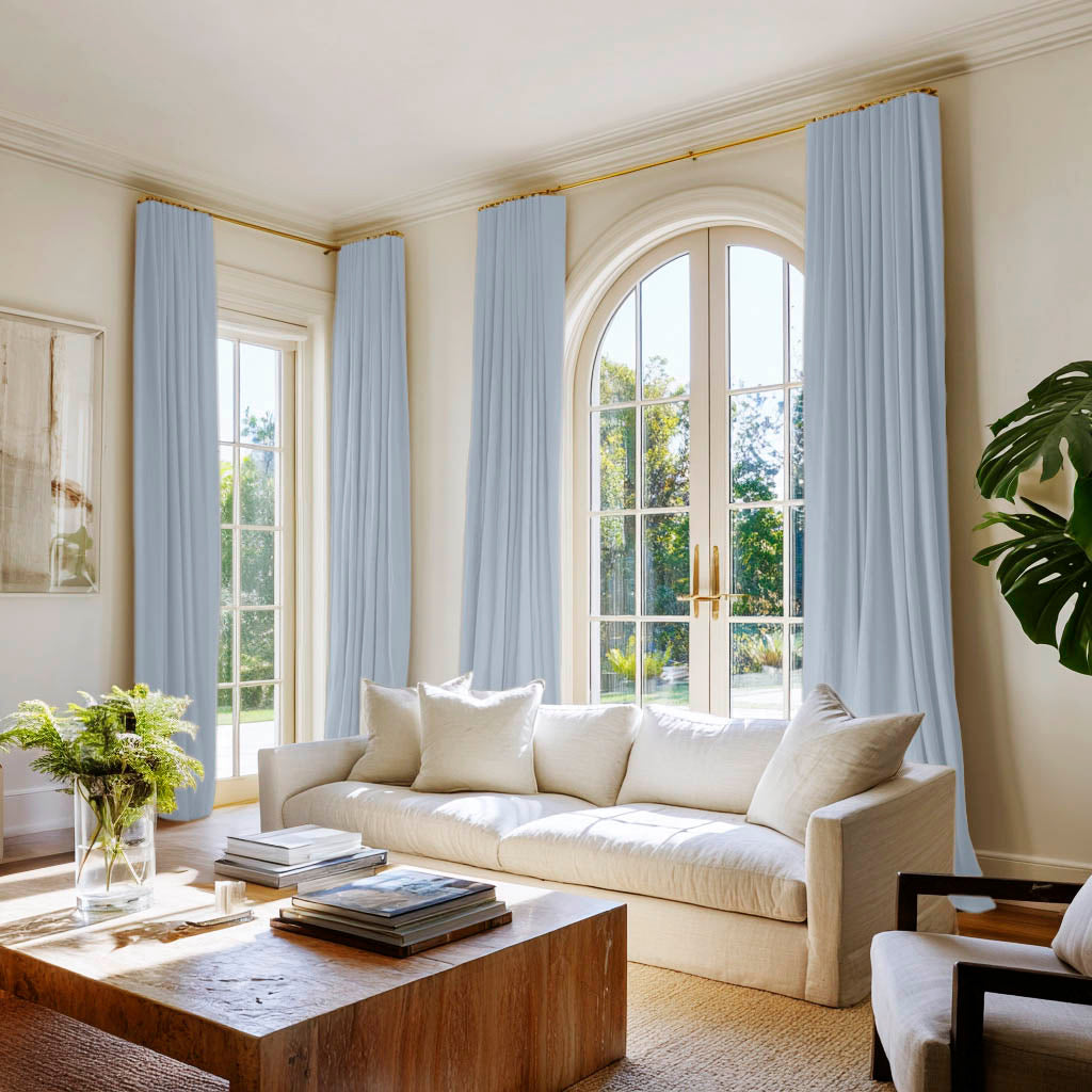 Amara Pale Blue curtains in an elegant living room