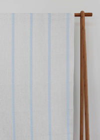 Rune Shadow Blue - vertical blue tone striped fabric.