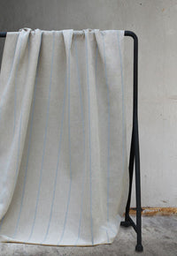 Ronja Sky - Natural fabric with light blue stripes