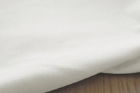 Amara White - Cotton fabric, close-up shot of the weave of this sturdy fabric