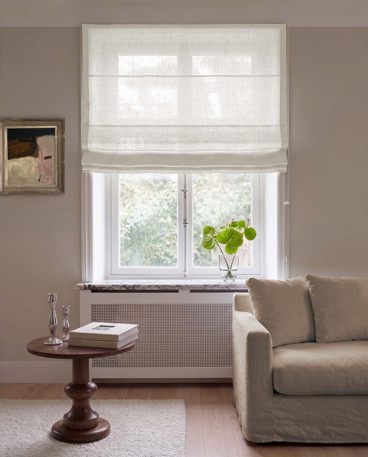 White linen Roman blind made of sheer linen. Living Room Window.