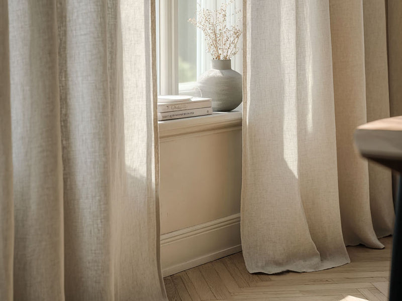 Close up of  bespoke lined curtains made of Beige curtain fabric,  bedroom window 