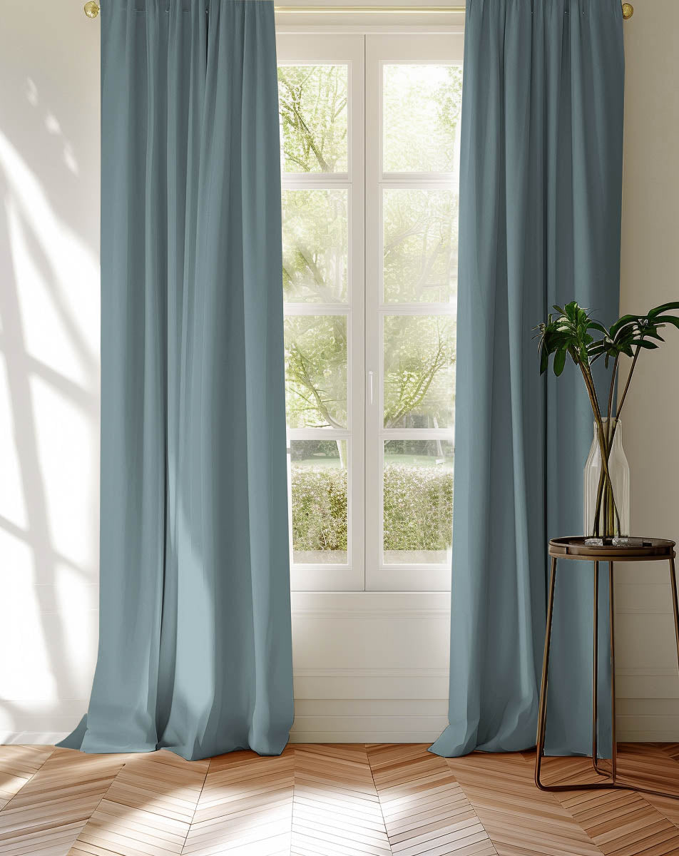 Pair of made to measure blue cotton curtains in Amara Blue Fog fabric