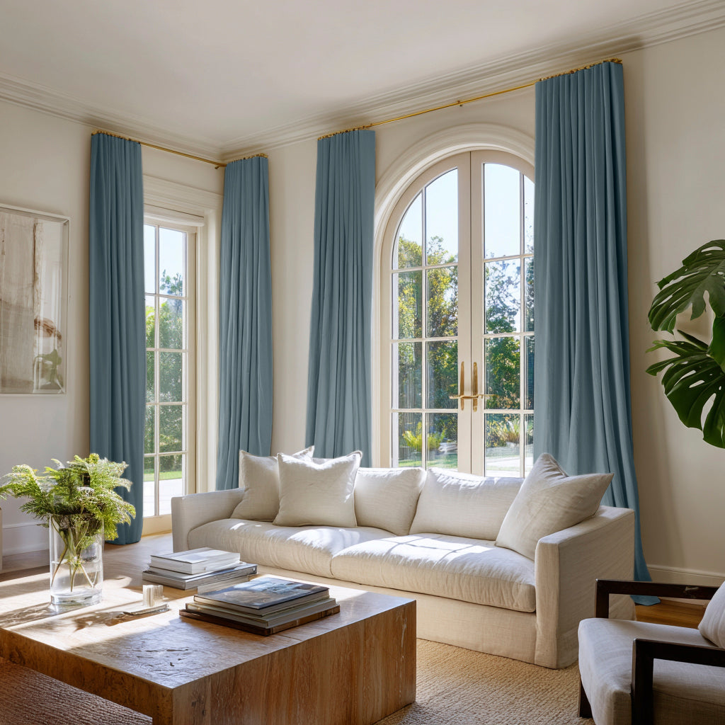 Two pairs of Blue cotton curtains in a contemporary living room setting