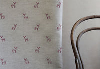 Deer Cherry - Curtain fabric with red pattern of deers