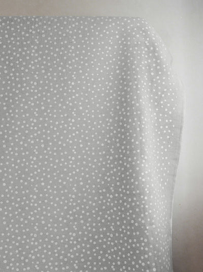 Dottie White - Natural fabric with white dots