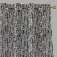 Black Patterned Linen Eyelet Curtains - Dora Noir - Natural base fabric.