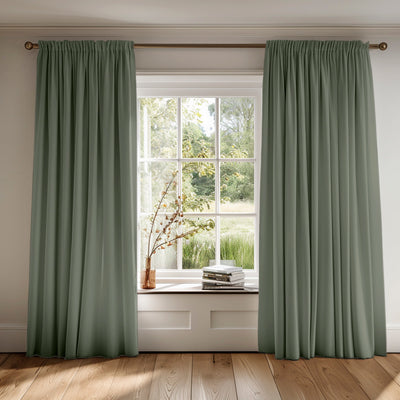 Green curtains made of cotton fabric