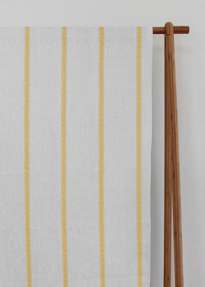 Rune Gold Amber - vertical yellow tone striped fabric.