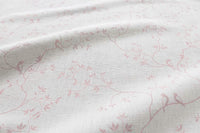 Pale pink Botanical Floral Fabric close-up shot