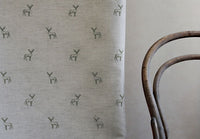 Deer Khaki - Curtain fabric with green pattern of deers