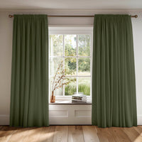 Green cotton curtains made of Amara Magic Pine fabric