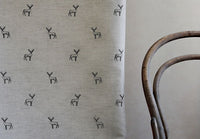 Deer Noir - Curtain fabric with black pattern of deers