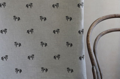 Horse Noir - Curtain fabric with black pattern of horses