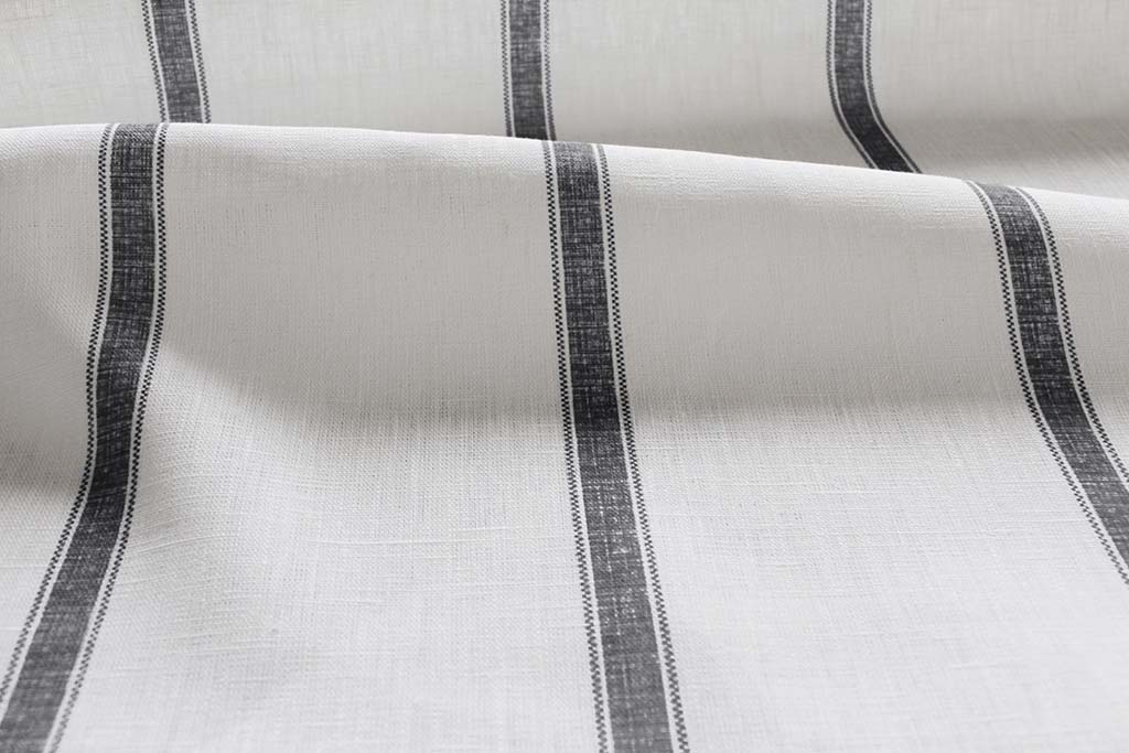 Rune Noir- vertical black tone striped fabric.