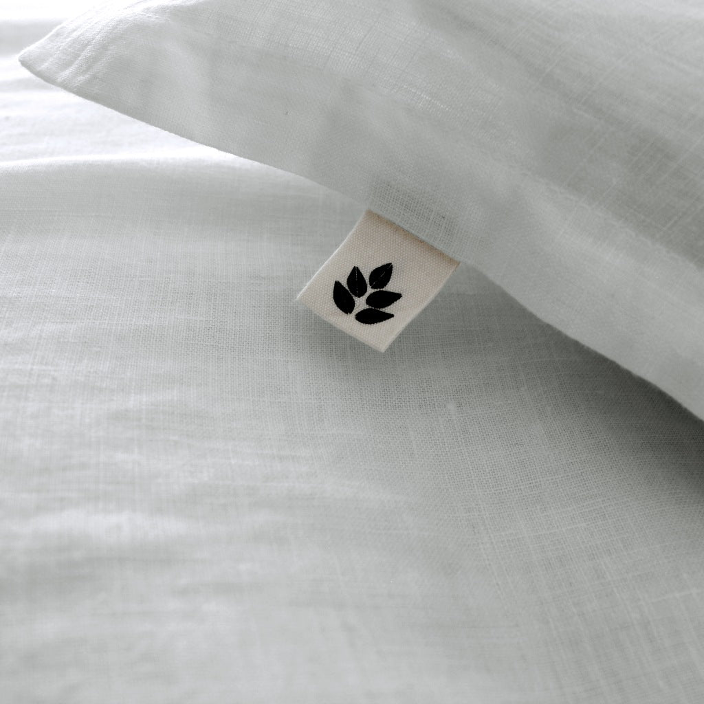 Off White Linen Bedding. Off White Linen Duvet Cover and Linen Sheets. Close Up