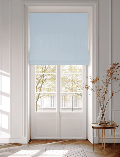Roman blinds made of light blue cotton fabric Amara Pale Blue