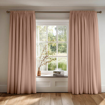 Muted pink curtains made of Amara Peony Powder Cotton fabric