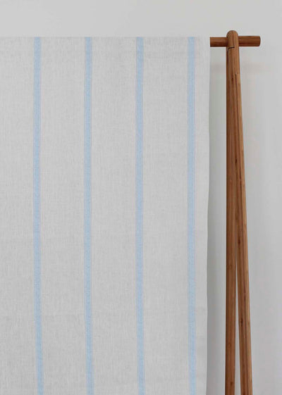 Rune Shadow Blue - vertical blue tone striped fabric.