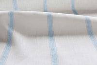 Rune Shadow Blue - vertical blue tone striped fabric.